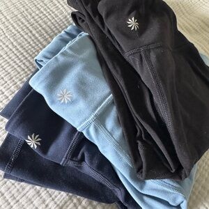 Athleta girls flares in navy, light blue, and black